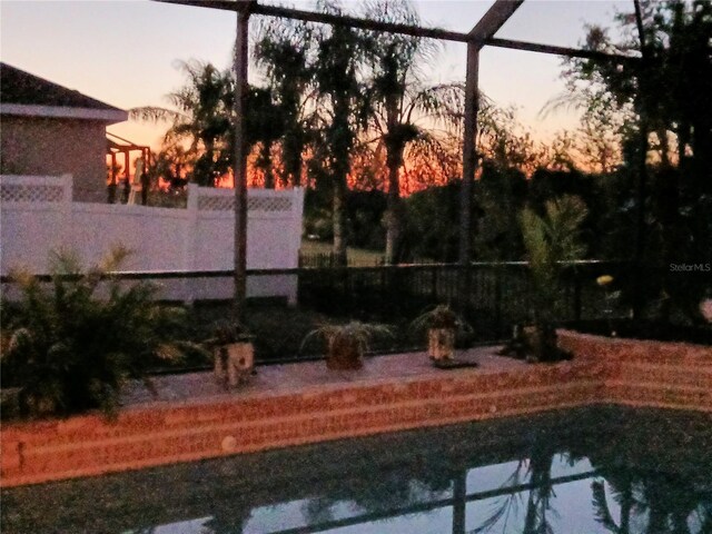 6631 63rd Ter E, Bradenton, FL 34203 - yard at dusk featuring fence