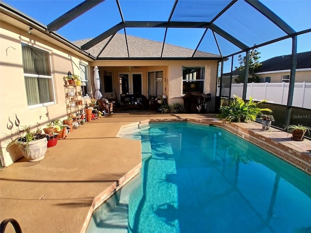 6631 63rd Ter E, Bradenton, FL 34203 - view of swimming pool with a patio area, ceiling fan, glass enclosure, and fence