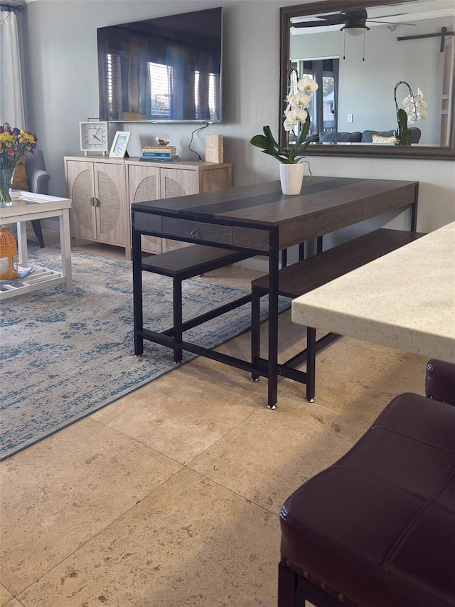 dining room featuring a ceiling fan