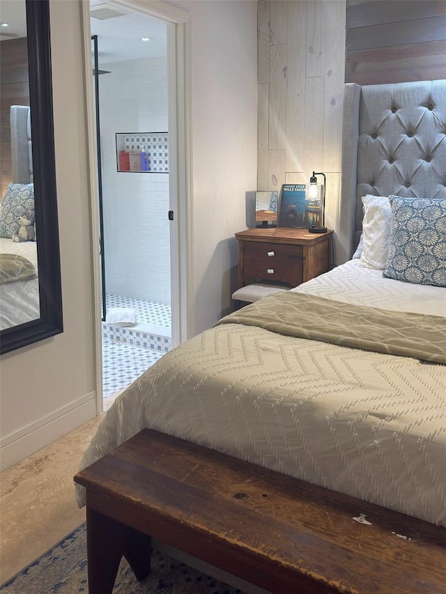 bedroom with wooden walls and baseboards