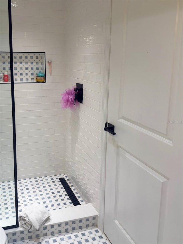 full bathroom featuring a stall shower
