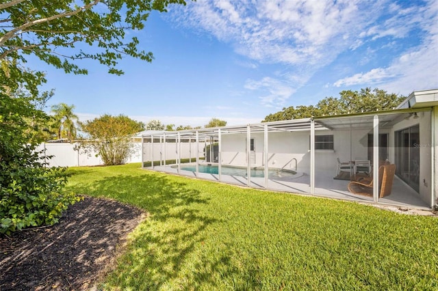 view of yard featuring a patio, a fenced backyard, and a fenced in pool