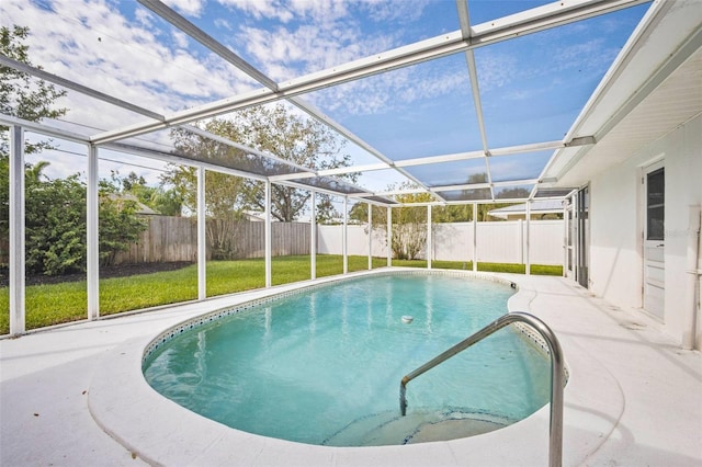 view of swimming pool featuring a lawn, a fenced backyard, a patio area, and a fenced in pool