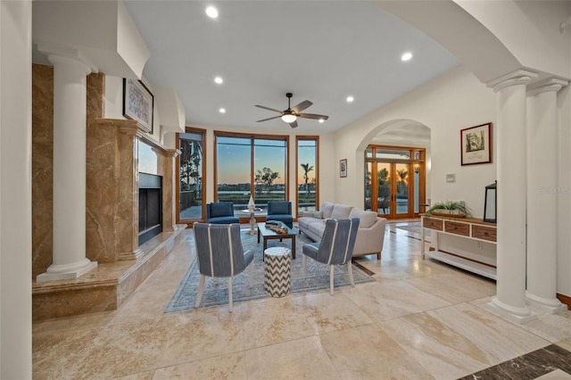 5830 Jamila River Dr, Venice, FL 34293 - living area featuring recessed lighting, marble finish floor, and ornate columns