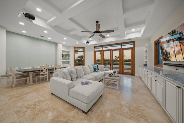 5830 Jamila River Dr, Venice, FL 34293 - living room with beam ceiling, recessed lighting, built in shelves, coffered ceiling, and ceiling fan