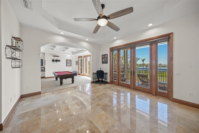 5830 Jamila River Dr, Venice, FL 34293 - rec room featuring billiards, arched walkways, a raised ceiling, baseboards, and visible vents
