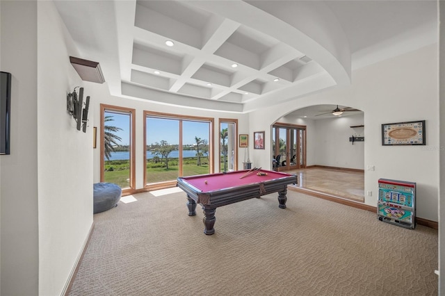 5830 Jamila River Dr, Venice, FL 34293 - game room featuring arched walkways, beam ceiling, baseboards, coffered ceiling, and carpet floors