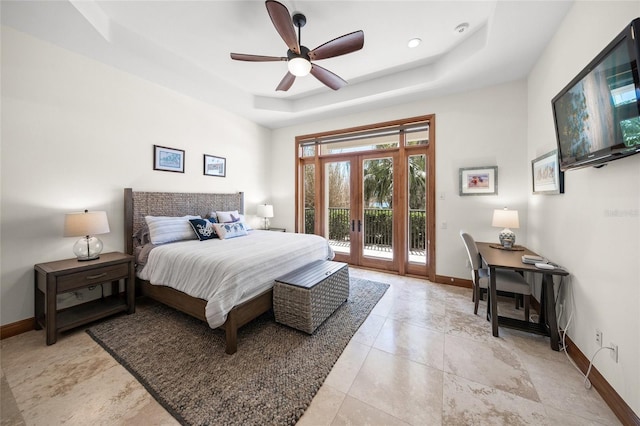 5830 Jamila River Dr, Venice, FL 34293 - bedroom featuring baseboards, access to outside, and a raised ceiling
