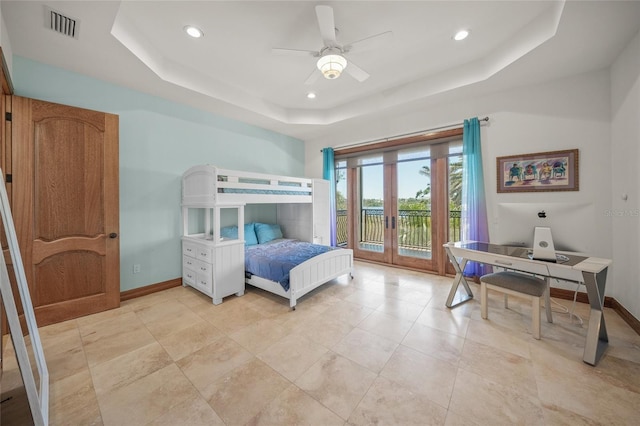 5830 Jamila River Dr, Venice, FL 34293 - bedroom featuring a tray ceiling, baseboards, access to exterior, visible vents, and recessed lighting