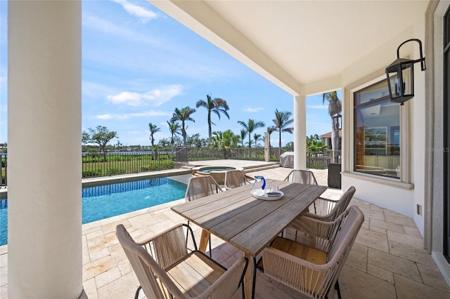 5830 Jamila River Dr, Venice, FL 34293 - view of pool with a fenced backyard, a patio, a pool with connected hot tub, and outdoor dining area