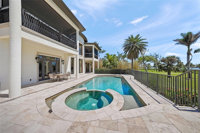 5830 Jamila River Dr, Venice, FL 34293 - view of swimming pool featuring a patio, a pool with connected hot tub, and french doors