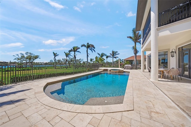 5830 Jamila River Dr, Venice, FL 34293 - view of swimming pool with a patio area, a pool with connected hot tub, and a fenced backyard