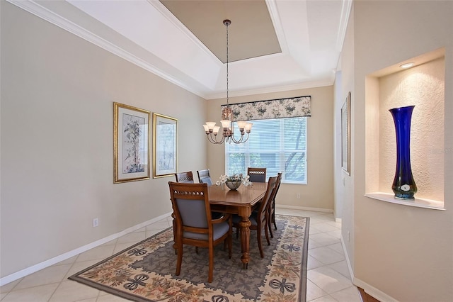 7528 Ascot Ct, Bradenton, FL 34201 - dining room featuring a chandelier, light tile patterned floors, ornamental molding, a raised ceiling, and baseboards
