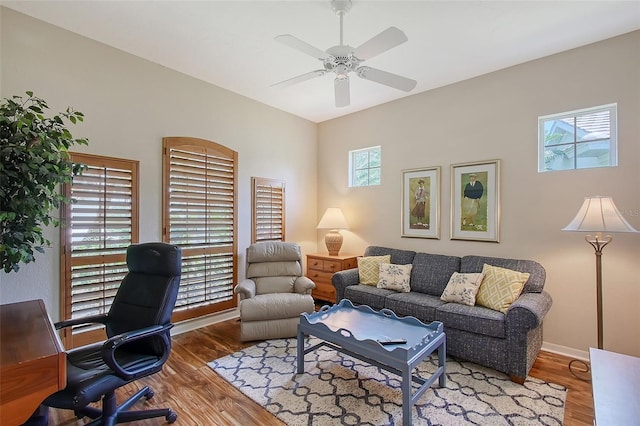7528 Ascot Ct, Bradenton, FL 34201 - office area featuring wood finished floors, ceiling fan, and baseboards