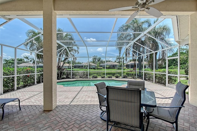 7528 Ascot Ct, Bradenton, FL 34201 - view of patio featuring glass enclosure, an outdoor pool, and a ceiling fan