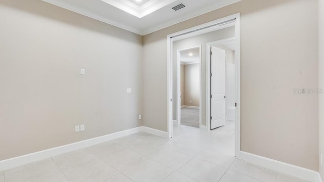 16202 Isola Pl, Bradenton, FL 34211 - empty room with ornamental molding, light tile patterned flooring, and baseboards