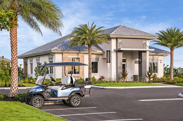 16202 Isola Pl, Bradenton, FL 34211 - view of building exterior with uncovered parking