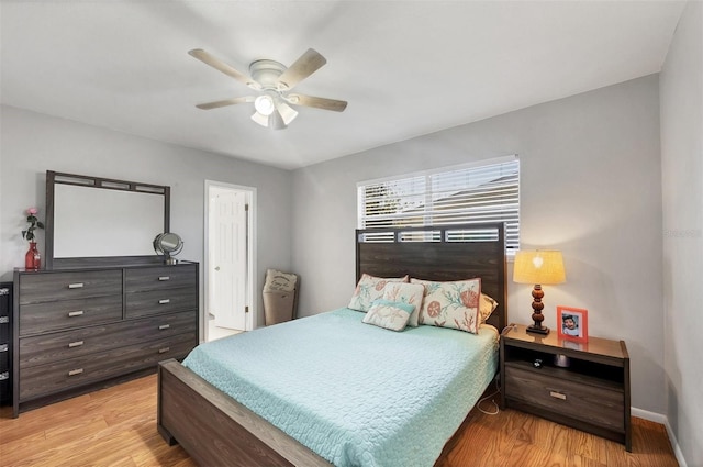 4243 Maceachen Blvd, Sarasota, FL 34233 - bedroom featuring baseboards, light wood-type flooring, and a ceiling fan