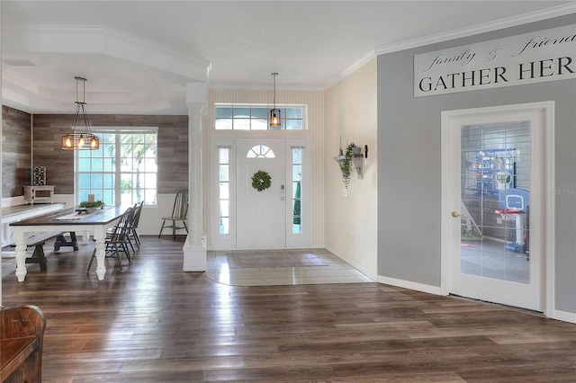 5810 Lake Victoria Dr, Lakeland, FL 33813 - foyer entrance featuring baseboards, ornamental molding, and wood finished floors