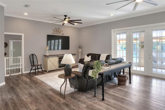 5810 Lake Victoria Dr, Lakeland, FL 33813 - living room with french doors, a ceiling fan, crown molding, and wood finished floors
