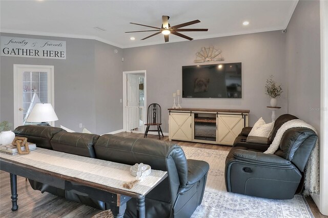 5810 Lake Victoria Dr, Lakeland, FL 33813 - living area with light wood-style flooring, crown molding, and ceiling fan