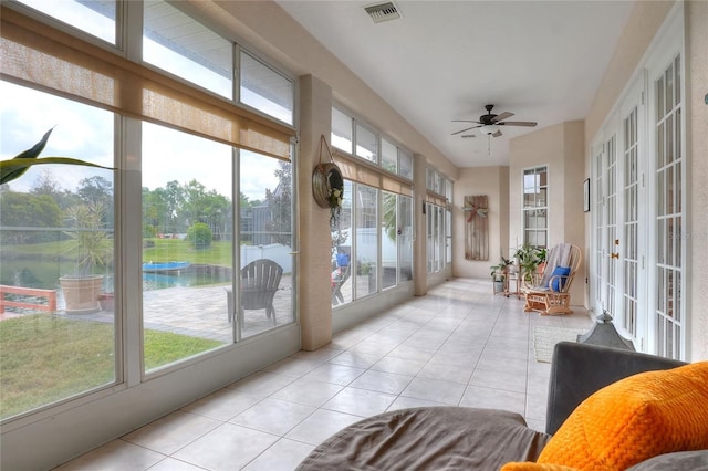5810 Lake Victoria Dr, Lakeland, FL 33813 - sunroom with tile patterned floors, french doors, and visible vents