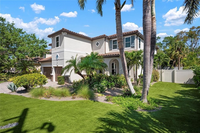 1719 Kenilworth St, Sarasota, FL 34231 - mediterranean / spanish-style home featuring a tile roof and stucco siding