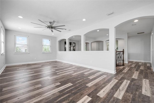 1719 Kenilworth St, Sarasota, FL 34231 - unfurnished living room with ceiling fan, recessed lighting, and dark wood-style flooring