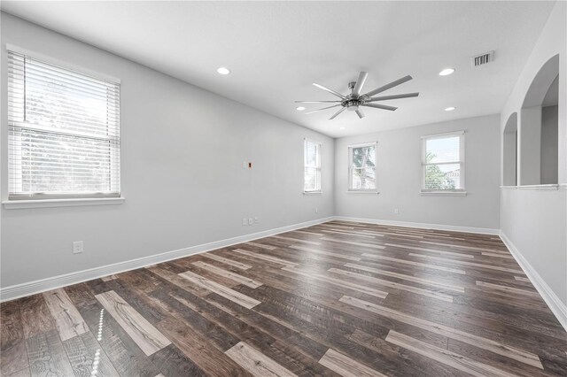 1719 Kenilworth St, Sarasota, FL 34231 - spare room with a ceiling fan, arched walkways, recessed lighting, and wood finished floors