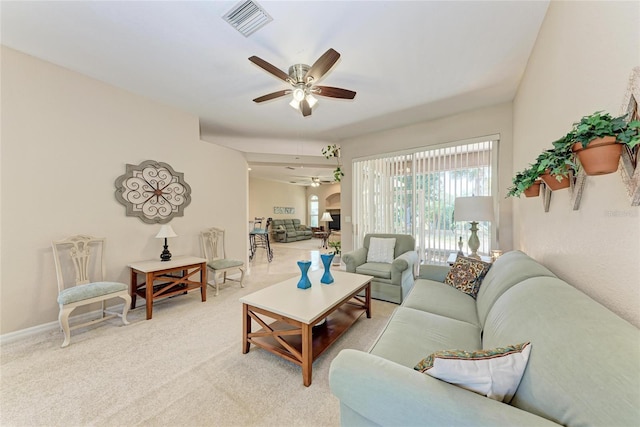 1631 Madison Ave, North Port, FL 34286 - living area with carpet, baseboards, a ceiling fan, and visible vents
