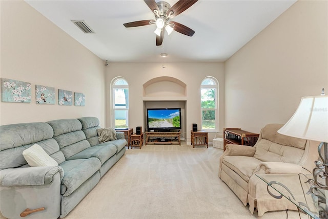 1631 Madison Ave, North Port, FL 34286 - living area with visible vents, a ceiling fan, light carpet, and a healthy amount of sunlight