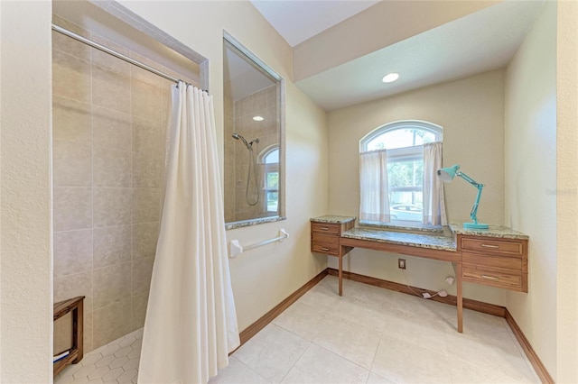 1631 Madison Ave, North Port, FL 34286 - bathroom featuring a tile shower, recessed lighting, and tile patterned flooring