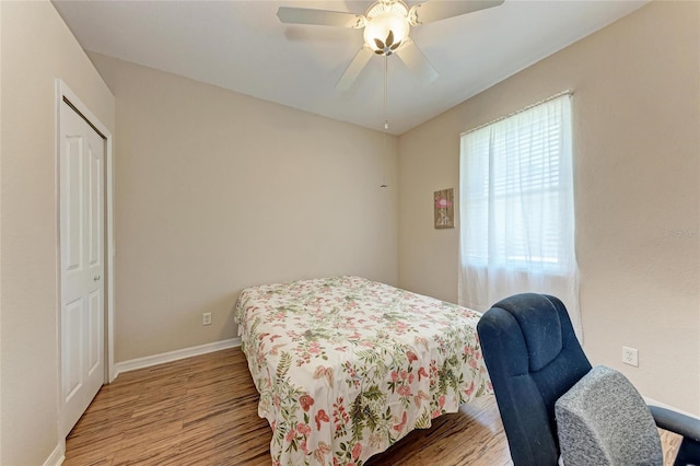 1631 Madison Ave, North Port, FL 34286 - bedroom with light wood-type flooring, ceiling fan, and baseboards