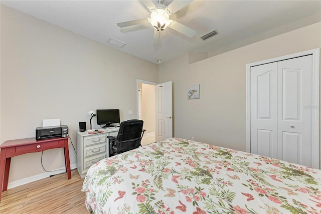 1631 Madison Ave, North Port, FL 34286 - bedroom with a closet, light wood-type flooring, baseboards, visible vents, and ceiling fan