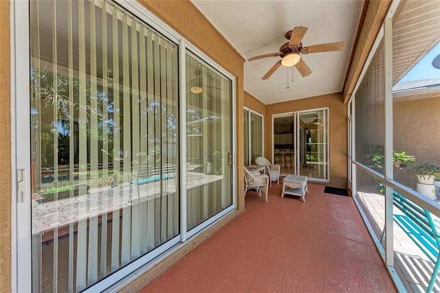 1631 Madison Ave, North Port, FL 34286 - unfurnished sunroom featuring a ceiling fan