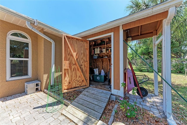 1631 Madison Ave, North Port, FL 34286 - view of exterior entry featuring stucco siding