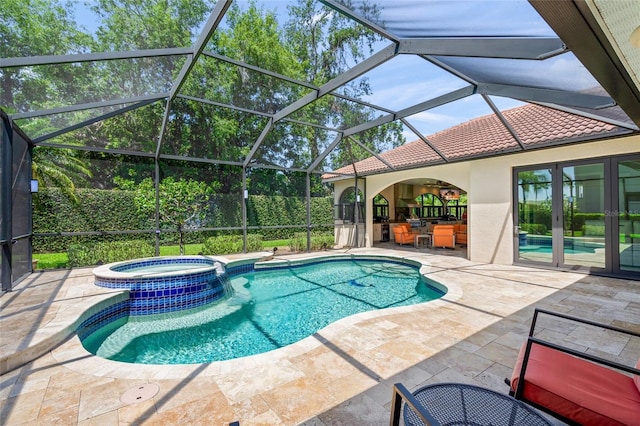 view of swimming pool featuring a lanai, a patio, french doors, and a pool with connected hot tub