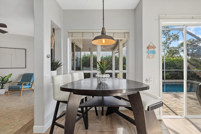dining area with ceiling fan