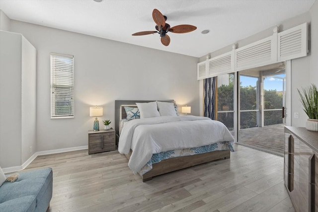 bedroom with light wood-style flooring, access to exterior, ceiling fan, and baseboards