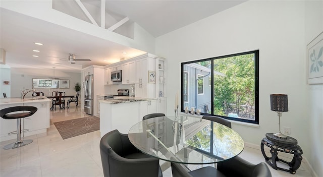 5324 Siesta Ct, Sarasota, FL 34242 - dining area with high vaulted ceiling and recessed lighting