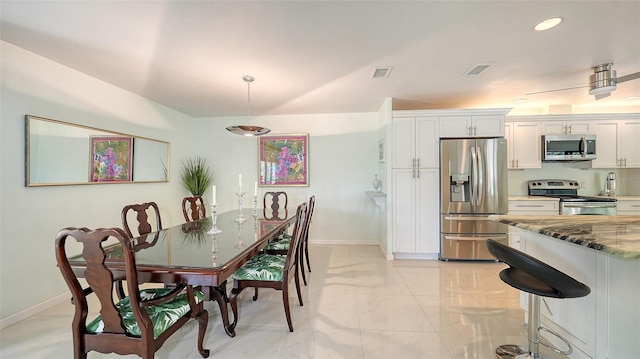 5324 Siesta Ct, Sarasota, FL 34242 - dining room with marble finish floor, baseboards, and visible vents