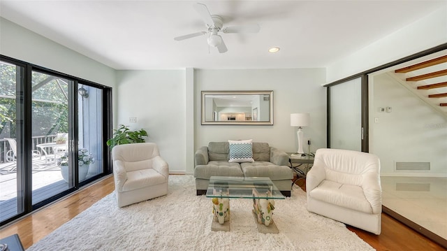 5324 Siesta Ct, Sarasota, FL 34242 - living room with visible vents, ceiling fan, stairway, recessed lighting, and wood finished floors