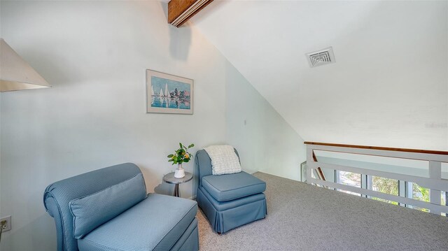 5324 Siesta Ct, Sarasota, FL 34242 - living area featuring carpet flooring, visible vents, and lofted ceiling with beams