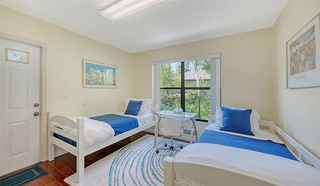 5324 Siesta Ct, Sarasota, FL 34242 - bedroom with baseboards and wood finished floors