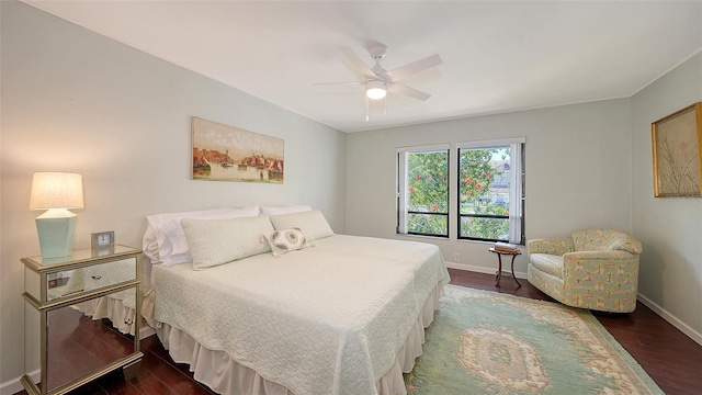 5324 Siesta Ct, Sarasota, FL 34242 - bedroom featuring baseboards, a ceiling fan, and dark wood finished floors