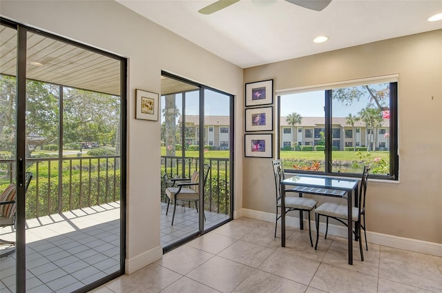 entryway with recessed lighting, tile patterned floors, baseboards, and ceiling fan