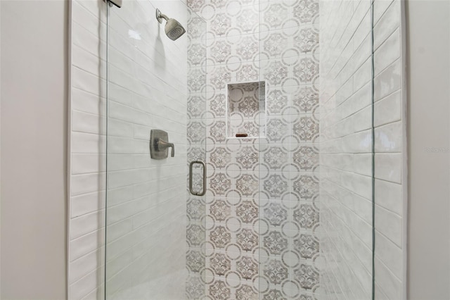 bathroom featuring a stall shower