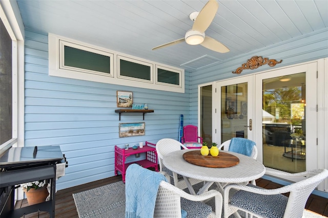 sunroom featuring french doors
