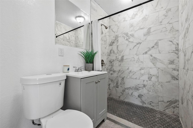 221 Duxbury Ave, Port Charlotte, FL 33952 - bathroom with vanity, a tile shower, and toilet