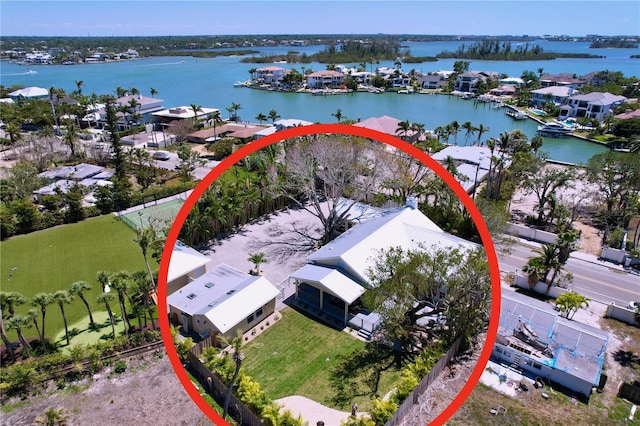 aerial view featuring a water view and a residential view